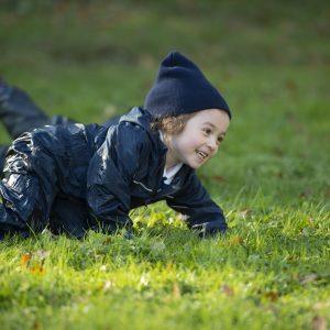 child playing on grass