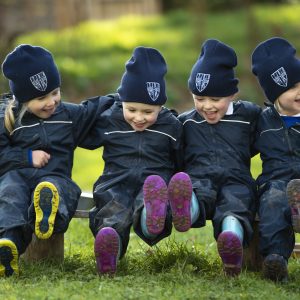 four children enjoying outdoor play