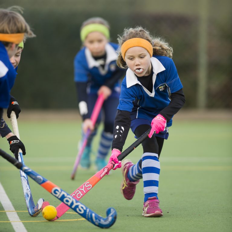 Students playing hockey