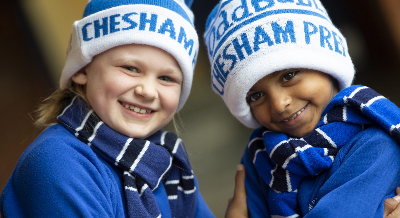 students wearing chesham prep hats and uniform