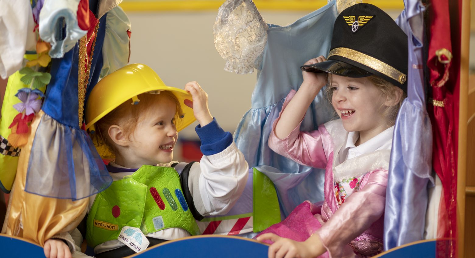 2 students playing in fancy dress